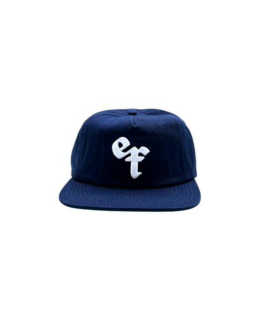 The Grandad Hat represents a unique shape, made with quality fabrics from durable cotton twill. Minimalist and timeless, the Grandad Hat is your go-to accessory for laid-back style. With a subtle embroidered EF logo, this cap adds polish to any outfit and brings a modern day approach to an unmatched era of style, the 90s.
Vintage visor with the green under brim for the connoisseur .Unisex 90s style EF streetwear snapback cap, navy grandad cotton hat with embroidery and green underbrim.