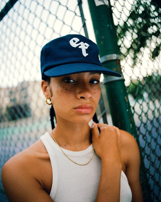 The Grandad Hat represents a unique shape, made with quality fabrics from durable cotton twill. Minimalist and timeless, the Grandad Hat is your go-to accessory for laid-back style. With a subtle embroidered EF logo, this cap adds polish to any outfit and brings a modern day approach to an unmatched era of style, the 90s.
Vintage visor with the green under brim for the connoisseur .Unisex 90s style EF streetwear snapback cap, navy grandad cotton hat with embroidery and green underbrim.