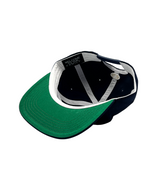 The Grandad Hat represents a unique shape, made with quality fabrics from durable cotton twill. Minimalist and timeless, the Grandad Hat is your go-to accessory for laid-back style. With a subtle embroidered EF logo, this cap adds polish to any outfit and brings a modern day approach to an unmatched era of style, the 90s.
Vintage visor with the green under brim for the connoisseur .Unisex 90s style EF streetwear snapback cap, navy grandad cotton hat with embroidery and green underbrim.