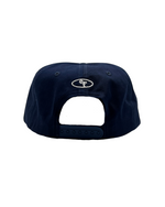 The Grandad Hat represents a unique shape, made with quality fabrics from durable cotton twill. Minimalist and timeless, the Grandad Hat is your go-to accessory for laid-back style. With a subtle embroidered EF logo, this cap adds polish to any outfit and brings a modern day approach to an unmatched era of style, the 90s.
Vintage visor with the green under brim for the connoisseur .Unisex 90s style EF streetwear snapback cap, navy grandad cotton hat with embroidery and green underbrim.