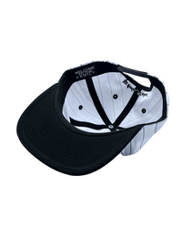 The Sports Hat represents a true staple of the 90s! This vintage athletic style classic snapback with a bold pinstripe design and unstructured silhouette is for those who put it in the work day in, day out.
Grind now, play later, and cop this 90s gem, the perfect throwback essential for streetwear lovers and active lifestyles.
90s Snapback hat with black stripe, black visor and white profile and EF logo. Vintage style snapback.
