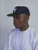 Unisex 90s style EF streetwear snapback cap, navy grandad cotton hat with embroidery and green underbrim 
